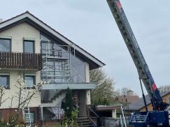 Die sanierte Fassade mit neuen Fenstern von PaX